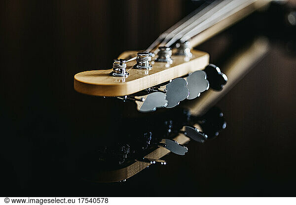 Studio shot of guitar headstock and tuning pegs