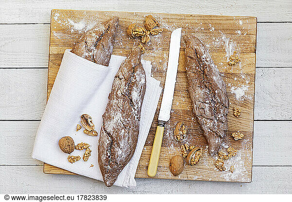 Studio shot of loaves of homemade whole wheat bread with walnuts