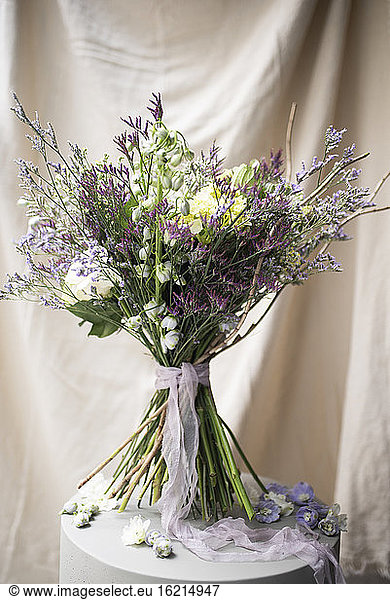 Studio shot of purple bouquet of summer flowers
