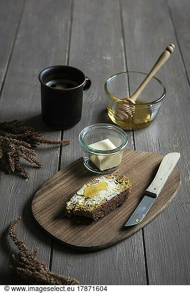 Studio shot of slice of pumpkin bread with honey