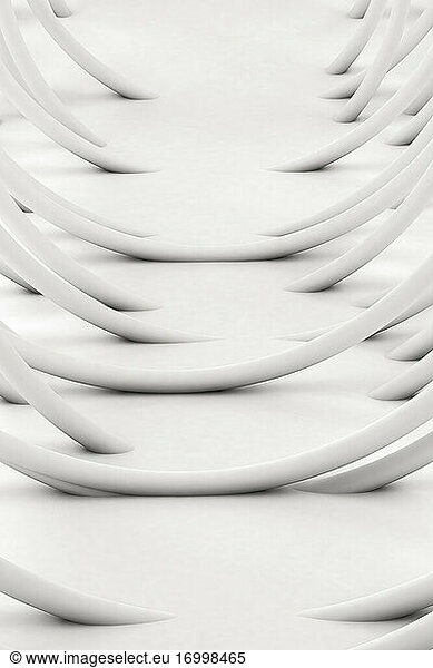 Studio shot of white arched tubes