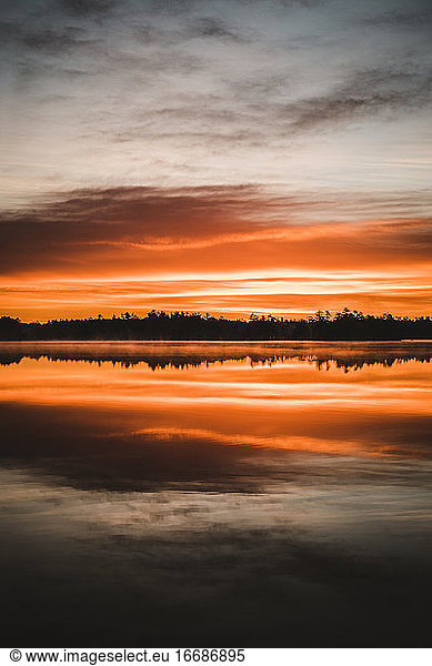 Stunning vibrant sunrise over Togue Pond  Baxter State Park  maine