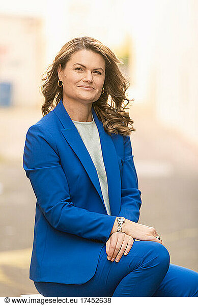 Stylish businesswoman in elegant blue suit