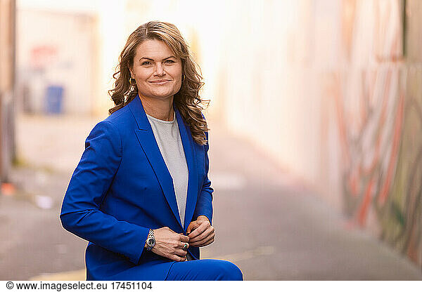 Stylish middle aged woman in formal suit
