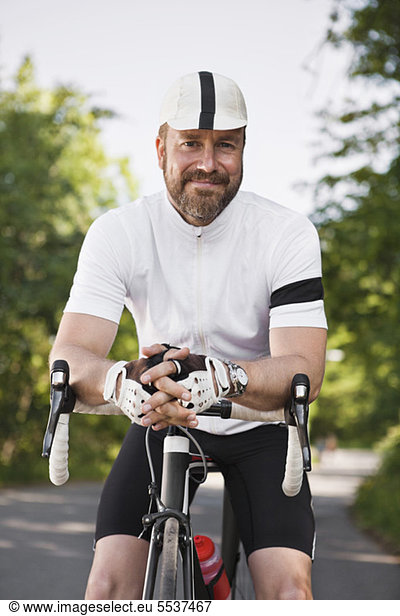 Successful cyclist smiling