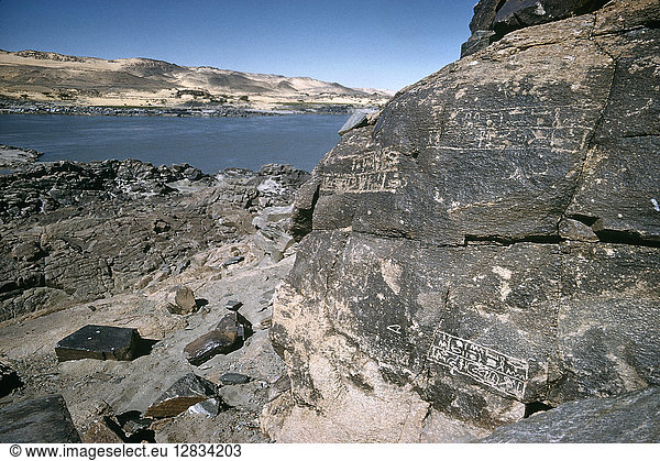 SUDAN: SEMNA EAST/WEST. A view of the Nile River between Semna East (or Kumma  in foreground) and Semna West in Nubia  northern Sudan  showing rocks with Egyptian inscriptions of the 12th Dynasty indicating water levels. Photographed c1970.