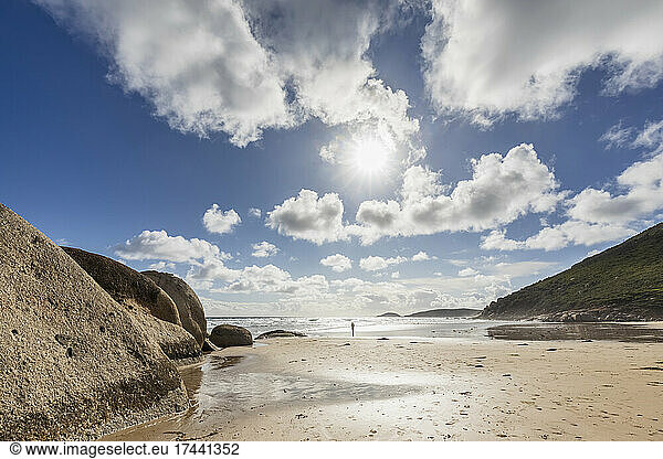 Sun shining over sandy coastal beach of Indian Ocean  Australia