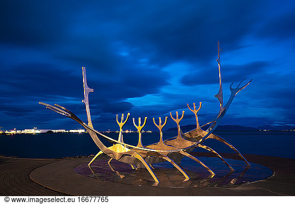 Sun Voyager sculpture against blue sky at night  Reykjavik  Iceland