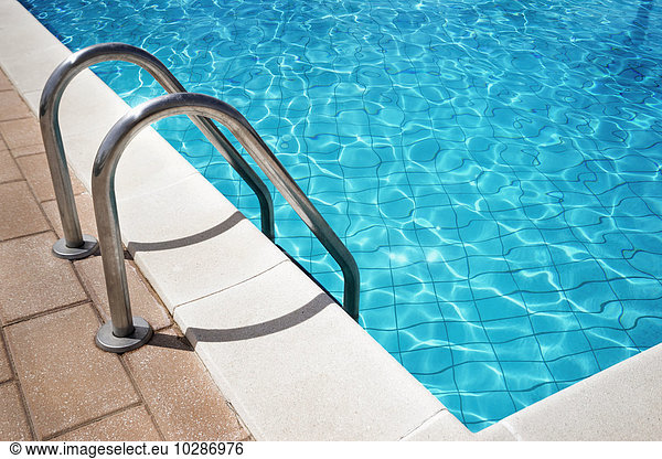 Sunlight reflected in swimming pool  Puglia  Italy