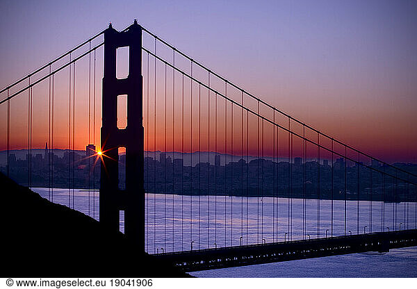 Sunrise over Golden Gate Bridge taken from Golden Gate National Recreation Area outside of San Francisco  California.