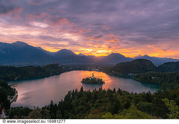 Sunrising over the mountainous lake of Slovenia