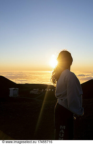 Sunset above the clouds on Mauna Kea
