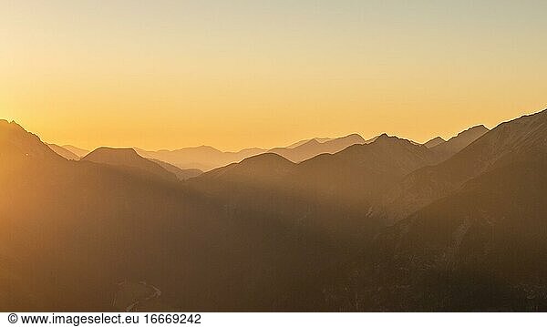 Sunset behind mountain silhouette  mountain landscape  view from the summit of Bärenkopf  Achensee  Karwendel  Tyrol  Austria  Europe