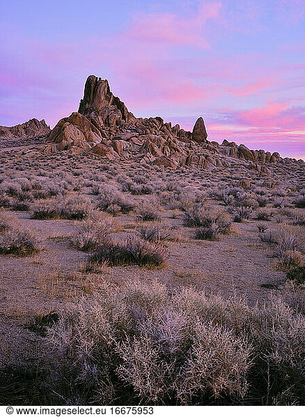 Sunset in the Alabama Hills  rock formations and cotton candy clouds.