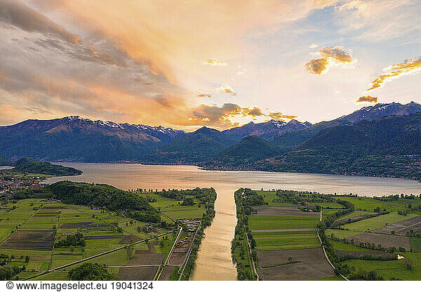 Sunset on river Adda flowing into Lake Como  Lombardy  Italy
