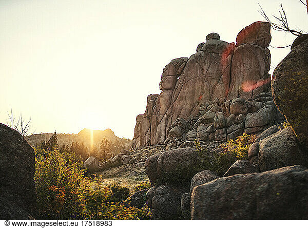 Sunset over boulders at Medicine Bow National Forest