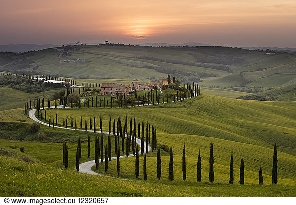 Sunset over the Agriturismo Baccoleno near Asciano in Tuscany  Italy  Europe