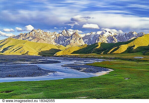 Sunset over the Central Tien Shan Mountains and glacier river  Kurumduk valley  Naryn province  Kyrgyzstan  Asia