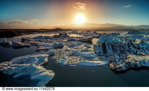 Sunset over the icebergs in the Jokulsarlon Glacial Lagoon  Iceland.