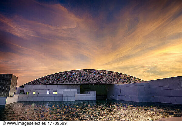 Sunset over the Louvre Abu Dhabi; Abu Dhabi  United Arab Emirates