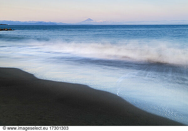 Sunset view of Mount Fuji from the beach  Shizuoka Prefecture  Japan