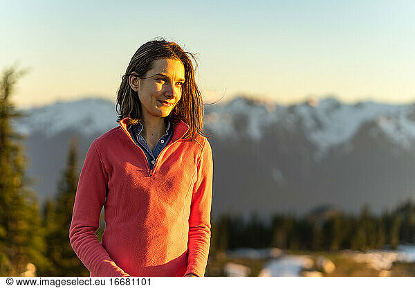 Sunset woman portrait at Olympic national park with dramatic backdrop