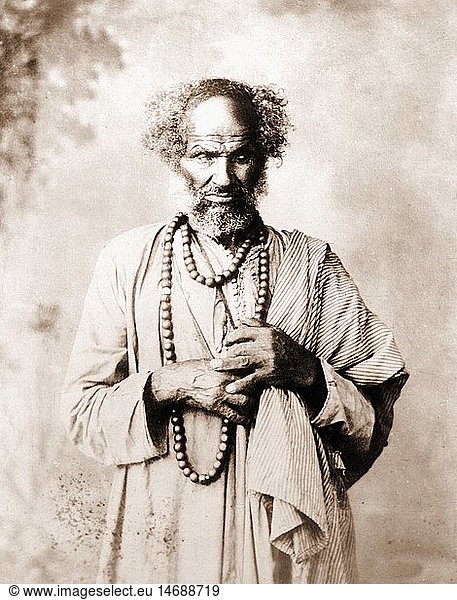 superstition  fortune telling  Arab fortune teller  North Africa  late 19th century  old man  people  men  man  necklace  necklaces  Africa  historic  historical  full beard  jewellery  jewelry historic  historical  fortuneteller  tellers  fortunetellers  future  male