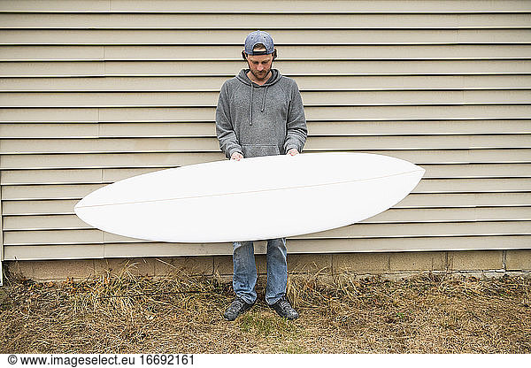 Surfboard Shaper refining a new design