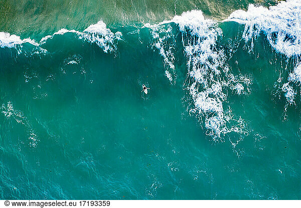 Surfer Girl in Green Water of Puerto Rico
