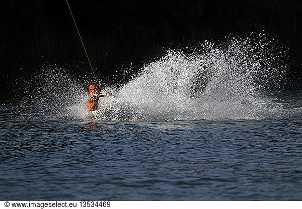 Surfer on a wakeboard  on a lake in Erfurt  Thuringia  Germany  Europe