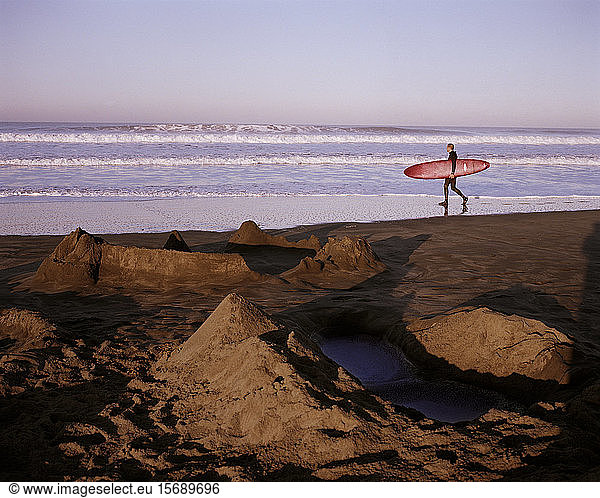 surfer  sand castles  beach