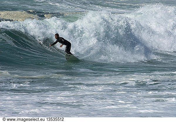 Surfer  surf at the Pointe de la Torche  Brittany  France  Europe