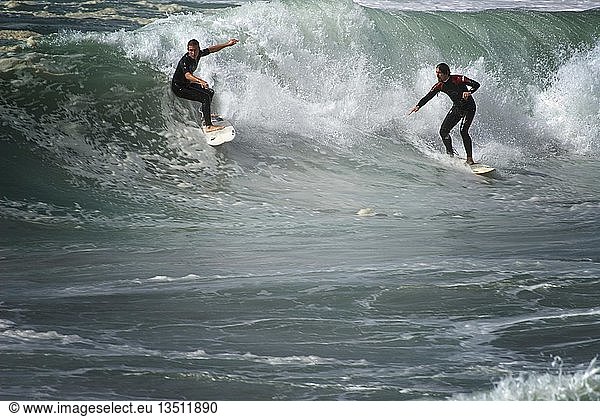Surfer  surge at the Pointe de la Torche  Bretagne  France  Europe