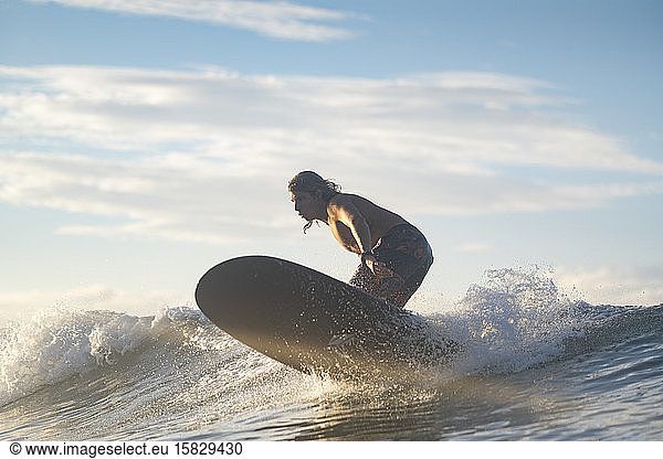 Surfing the sunrise in Costa Rica