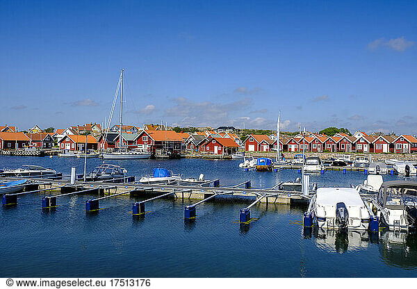 Sweden  Vastra Gotaland County  Vajern  Boats moored in marina of coastal town in summer