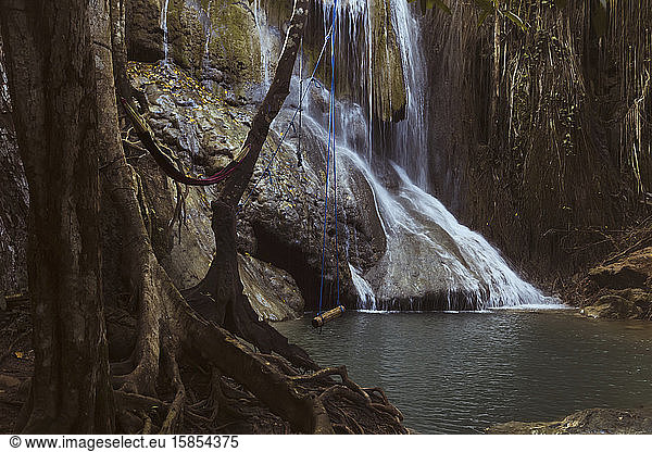 Swing near waterfall