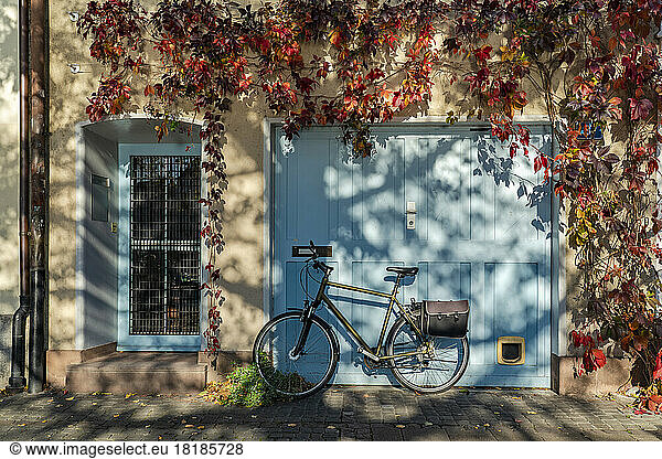 Switzerland  Basel-Stadt  Basel  Bicycle in front of house in autumn