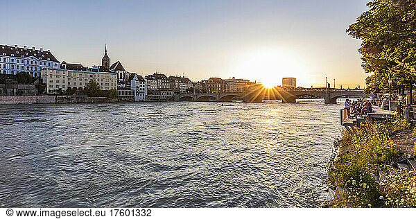 Switzerland  Basel-Stadt  Basel  View of river Rhine and Middle Bridge at sunset