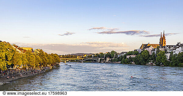 Switzerland  Basel-Stadt  Basel  View of river Rhine at dusk with bridge in background
