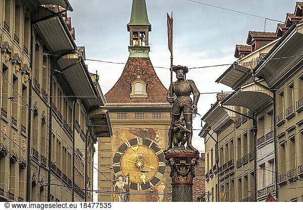 Switzerland  Bern Canton  Bern  Schutzenbrunnen fountain with clock tower in background
