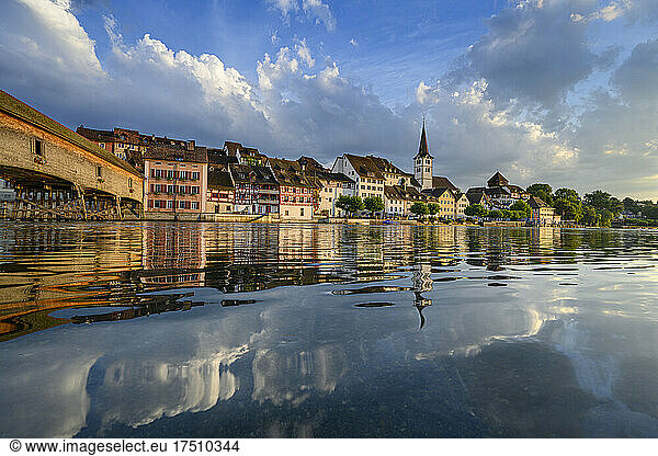 Switzerland  Canton of Thurgau  Diessenhofen  Shiny surface of High Rhine with village houses in background
