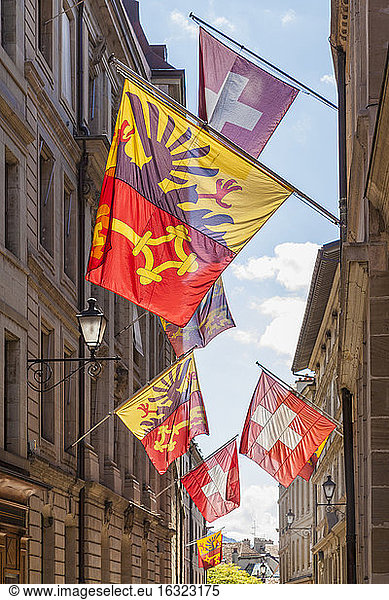 Switzerland  Geneva  Rue de Hotel de Ville  flags of city  canton and state