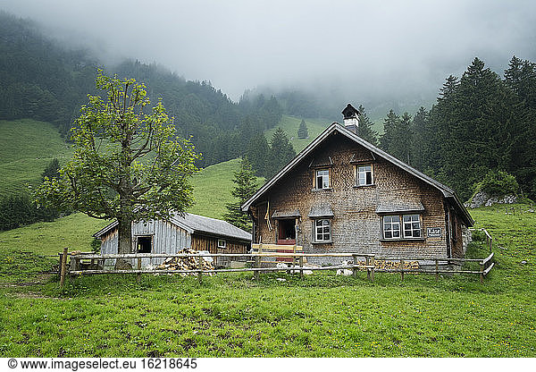 Switzerland  View of mountain hut in swiss alps