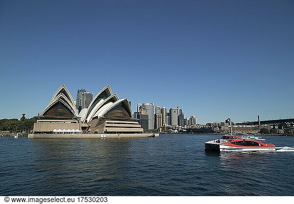 Sydney Opera House with a tourist boat going past  Sydney  New South Wales  Australia  Oceania