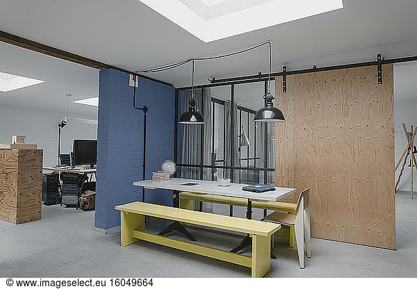 Table and benches in modern office