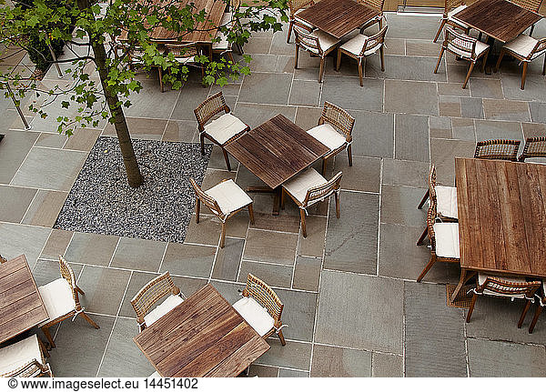 Tables and chairs on restaurant patio