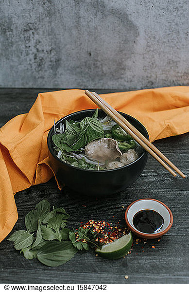 Tasty Bowl of Vietnamese Pho Soup with Ingredients