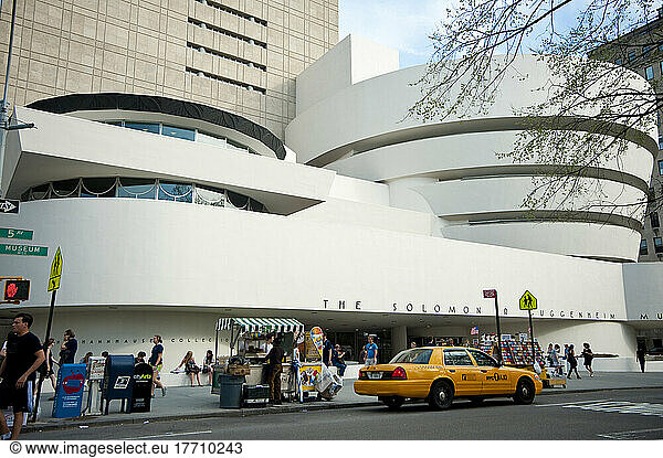 Taxi In Front Of The Guggenheim Museum  Museum Mile  Manhattan  New York  Usa