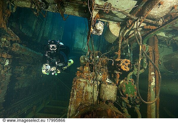 Tech diver in wreck  engine room  diesel engine  tech diving  technical diving  mixed gas diving  Nitrox  Trimix  Heliox  Gozo  Malta  Europe  Mediterranean Sea  Europe