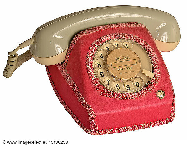 technics  telephone  telephone with textile cover  pink textile cover as decoration  Germany  circa 1971  dials  telephone dial  dial selector  dial  dialling  dialing  1971  70s  old  deco  decoration  decorations  deco cover  German Federal Post Office  clipping  cut out  cut-out  cut-outs  fixed-line network  landline network  campy  corny  cap  caps  kitsch  hokum  trashy  cult  cults  curious  oddities  oddity  curiosity  curiosities  post office telephone  protective cover  protective covers  seventies  style  symbol  symbols  symbol image  symbolism  imageries  symbolic  symbolical  phone call  telephone call  ring  buzz  phone calls  telephone calls  rings  incoming call  telephone  telephones  phones  telephone charges  call charges  phoning  calling  phone  call  telecommunication  telecom  textile cover  typical  casing  casings  living accessoire  telecommunications  object  objects  stills  20th century  1970s  historic  historical